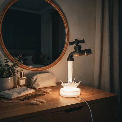 Floating faucet lamp pouring a glowing stream of light — photo 3