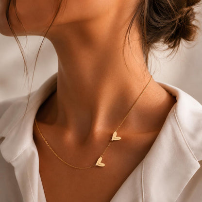 Minimalist Asymmetrical Intertwined Heart Pendant