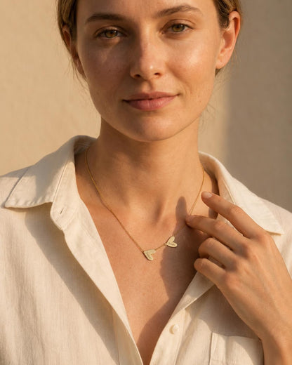 Minimalist Asymmetrical Intertwined Heart Pendant